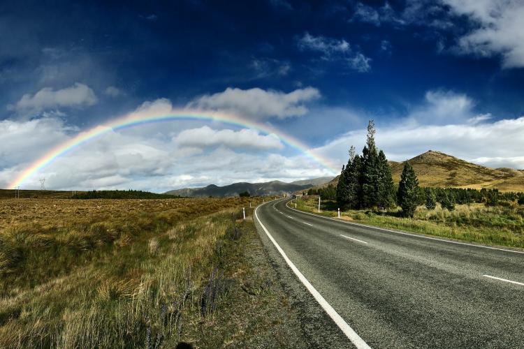 Rainbow over a road